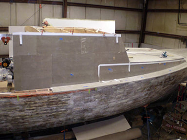 Refit and restoration of twist downeast power yacht boat wooden housing structure