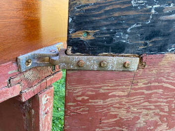 Middle bronze rudder hardware, pintle and gudgeon, for a catboat cast from patterns built by South Shore Boatworks