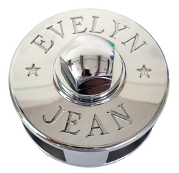 chromed bronzesteering wheel hub and wheel nut engraved with emma jean built by south shore boatworks for sailing yacht or ship