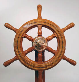 varnished wooden ship yacht wheel for sandpiper 1966 Hinckley Pilot Cutter built by south shore boatworks 