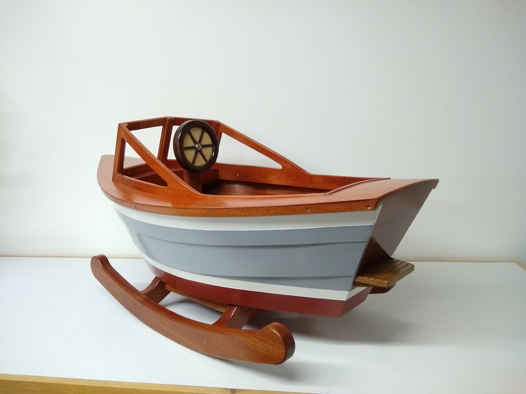Custom wooden plymouth rock'r wooden children's rocking boat cradle built by South Shore Boatworks