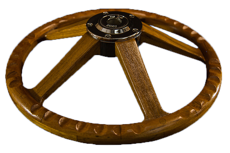 back side of the south shore boatworks performance plus steering wheel for powerboats with teak finger grips and bronze hub