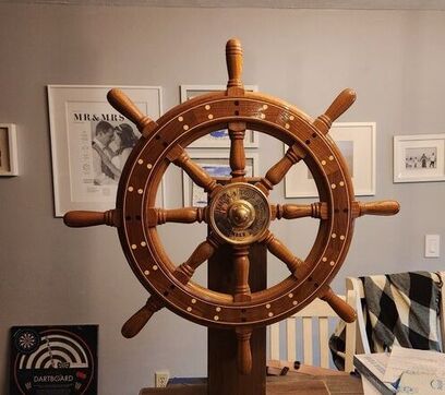 Wedding wooden steering wheel engraved with date and name on bronze hub by south shore boatworks